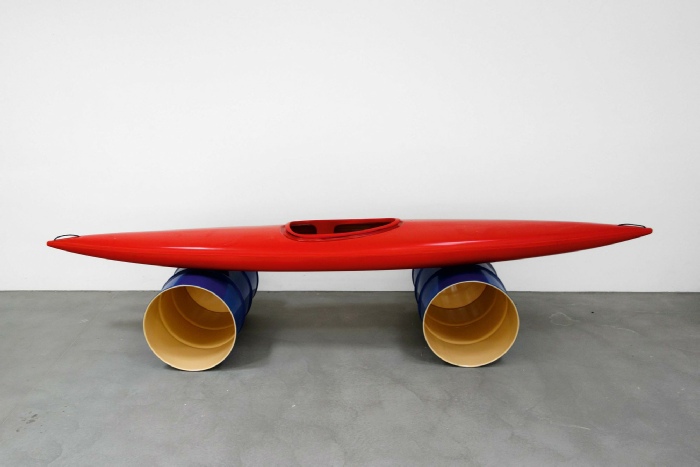 Roman Signer,  Kajak mit blauen Fässern, 2016. Sculpture, 200 cm x 90 cm x 60 cm. Photo: Aleksandra Signer.  Courtesy the artist 